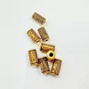 Online Set de 8 cuentas tubo oro Bisutería